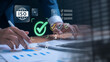 © IDOL'foto - ISO certification and quality compliance concept. businessman reviewing audit documents on laptop, focusing on digital checklist, performance validation, and process improvement for standard assurance