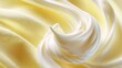 © fotofabrika - Creamy swirl of vanilla soft serve ice cream displayed on a smooth surface