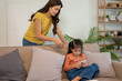 © PIC SNIPE - Lovely mom and little young daughter spending time together in their living room.