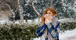 © RecCameraStock - A woman walks through a snow-covered park, sneezing and holding a napkin. The winter scenery creates a serene backdrop as she battles her cold or migraine.
