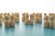 © Daniele Mezzadri - Two identical wooden figures among heterosexual pairs, symbolizing equality, diversity, and inclusion.