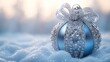 © TITISCAHYA - Festive blue ornament in snow