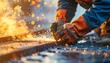 © 19.911a Digital - A close-up view of a welder's gloved hands expertly joining metal with a bright arc of sparks and molten material.