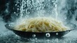 © VALENTYNA - Cooked pasta draining linguine in black colander with water streaming dynamic splash patterns atmospheric steam droplets motion photography