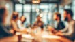 © hao - Blurry Team Meeting Background - Soft-focus image of a team meeting with blurred surroundings. High quality