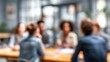 © hao - Blurry Team Meeting Background - Soft-focus image of a team meeting with blurred surroundings. High quality