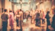 © li - Networking Event Attendees Blurred - People networking at an event, with the background blurred to emphasize the interactions. High quality