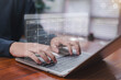 © wanchai peatoo - Person typing on a laptop with a digital calendar interface, representing scheduling, time management, online planning, productivity tools, appointment organization, and efficient workflow in modern.