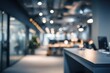 © morepiixel - A blurred office interior showcasing modern workspace design with soft lighting and an inviting atmosphere.