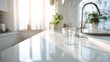 © ryan - Minimalist kitchen scene top-down with single transparent glass on bright countertop, soft morning light, wide empty surface for clean business presentation, marketing, and analytics layout