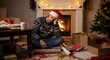 © Tiana_Geo - Exhausted man sleeps on floor surrounded by messy gift wrapping. For holiday stress, Christmas prep fatigue, procrastination concepts, and relatable seasonal content.