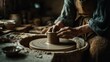 © Anastasiya Ri - Hands shaping wet clay on a rotating pottery wheel in a rustic workshop with soft warm light ideal for craft visuals creative tutorials and handmade product themes