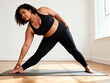 © Andrey - Plus-size woman stretching yoga pose