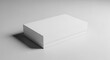 © Shahanaj - White rectangular box with lid on gray surface with shadow image