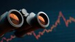 © nameera_hasan - binoculars observing financial market chart