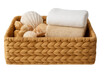 © PerfectPhoto - Wicker basket holding towels and natural seashells for spa