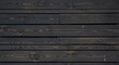 © Element 3D - Close-up background texture of dark charcoal weathered horizontal wooden planks with natural grain and knots.