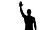 © Hini - Silhouette of a man raising his hand in a gesture of greeting or asking a question.