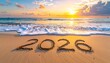© faiz_99 - Ocean sunrise with soft waves touching beach sand where 2026 is written, symbolizing hope, new beginnings, and a peaceful Happy New Year concept