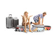 © Ljupco Smokovski - Funny young couple trying to close overpacked suitcases
