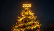 © AlgoCreative - Beautifully decorated Christmas tree glows warmly against starry night sky, adorned with golden lights and red ornaments, topped with illuminated numbers 2026 creating festive atmosphere