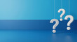 © Sulastri - Three white question marks suspended against a gradient blue background, symbolizing inquiry and curiosity.