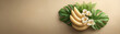 © Anatthaphon - Refreshing and healthy food arrangement of tropical banana fruit bunch with green leaf and flower creating calm, natural feeling