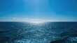 © CryptoCanvas - The vast blue ocean under a clear sky, a serene backdrop for relaxation and travel