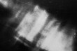 © Uuganbayar - Old film texture with scratches, noise and light leaks. Realistic transparent overlay film texture in black-white, dust and grain. Distressed retro movie or photo negative effect of cinema nostalgia