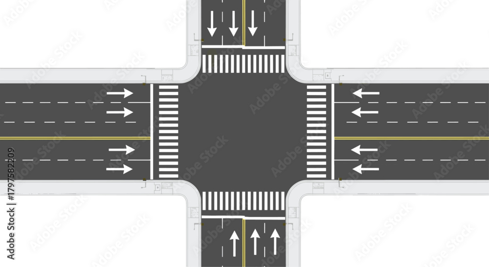 Clear road intersection with crosswalks, lane markings, and directional ...
