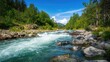© AkuAku - Scenic landscape featuring a mountain river under summer sunlight, highlighting the rapid flow of water and rocky terrain