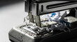 © Platon - Office frustration: A metal stapler struggling with messy staples.An extreme, close-up, dramatic shot focusing on the head of a dark, grey stapler on a light-grey surface