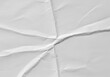 © intothestar - Heavily wrinkled white paper backdrop showing deep creases and rough, distorted texture suitable for abstract backgrounds ,horizontal ,wrinkled ,texture