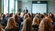 © janzwolinski - Corporate presentation with a speaker engaging an audience