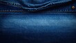 © Hanania Project - Dark blue jeans texture background with copy space