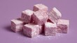© Juan - Cubes of pink Turkish delight on lilac surface