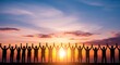 © Kashif - Silhouette of a cheering team holding hands with raised arms against a vibrant sunset sky. (15 words)