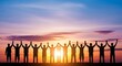 © Kashif - Silhouette of a cheering team holding hands with raised arms against a vibrant sunset sky. (15 words)