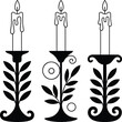 © Kingkor - Three black silhouette candelabras with lit candles