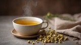 Closeup of steaming chamomile tea in a cozy ceramic cup resting on a beige linen coaster with fresh chamomile flowers and soft fabric in warm, inviting tones, evoking comfort and relaxation