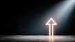 © Elena - Glowing upward arrow on dark textured surface symbolizing ambition and direction with minimalist style and ample copy space to the right