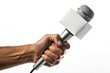 © Muhammad - Hand holding a microphone for interview or news reporting