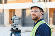 © Serhii - Surveyor using theodolite for land measurement