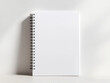 © Stockistock - Blank White Spiral Notebook Vertical Mockup