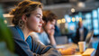© Kateryna - Faceless people relaxing during lunch break coworking space environment defocused background elements modern workplace culture contemporary office setting social interaction