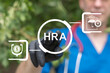 © wladimir1804 - HRA - Health Reimbursement Arrangement Medical Concept. Doctor using virtual touch screen presses the abbreviation HRA.