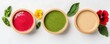Wellness meditation detox concept. Three bowls of colorful sauces with fresh leaves and flowers on a light background.