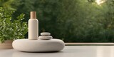 Wellness meditation detox concept. A serene arrangement of a lotion bottle and stones beside greenery.