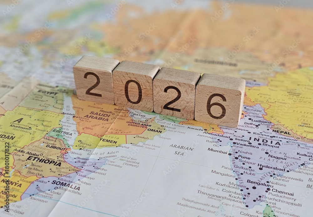 Photo Stock Wooden Blocks Showing The Year 2026 Placed On A Detailed 1000 F 1801017822 