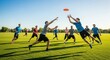 © photoplotnikov - Group of young males playing ultimate frisbee on a sunny day outdoors